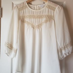 Delia's white and cream lace blouse